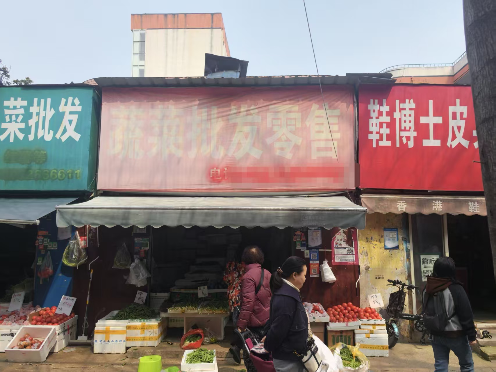 青山区三弓路钢城八中旁临街15平门面出租